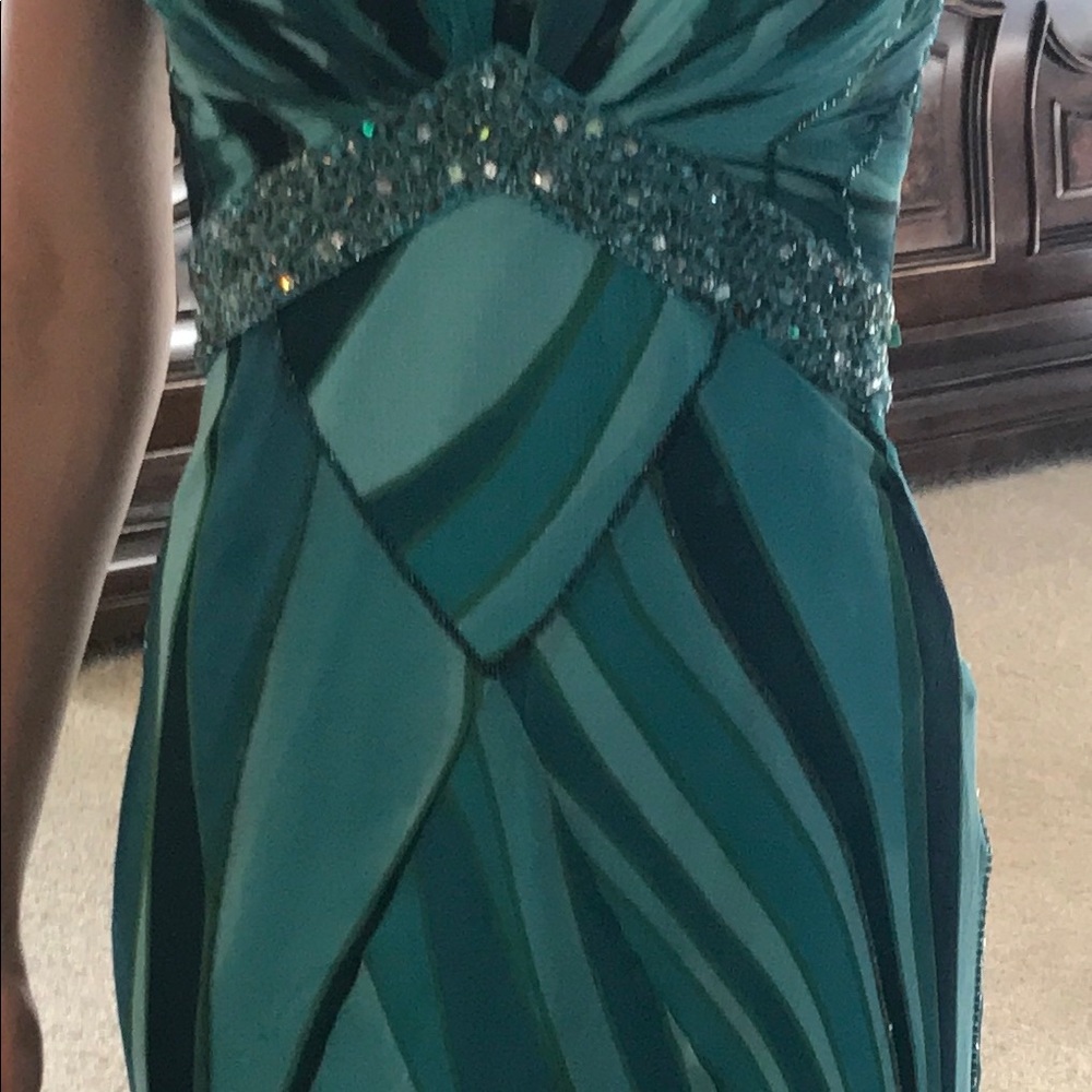 Nina Austin turquoise stunning dress.